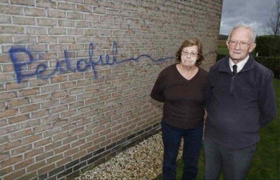 HUISGEVEL IN DE CANADEZENLAAN ONDER DE GRAFFITI